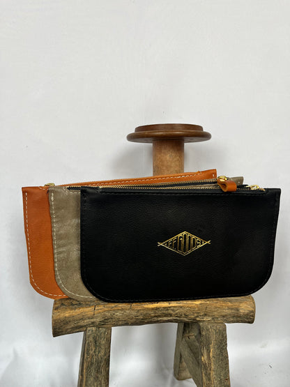 Finns Fickle Goods Leather Clutch